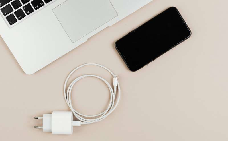 The ideal setup is a single charger for both your laptop and phone